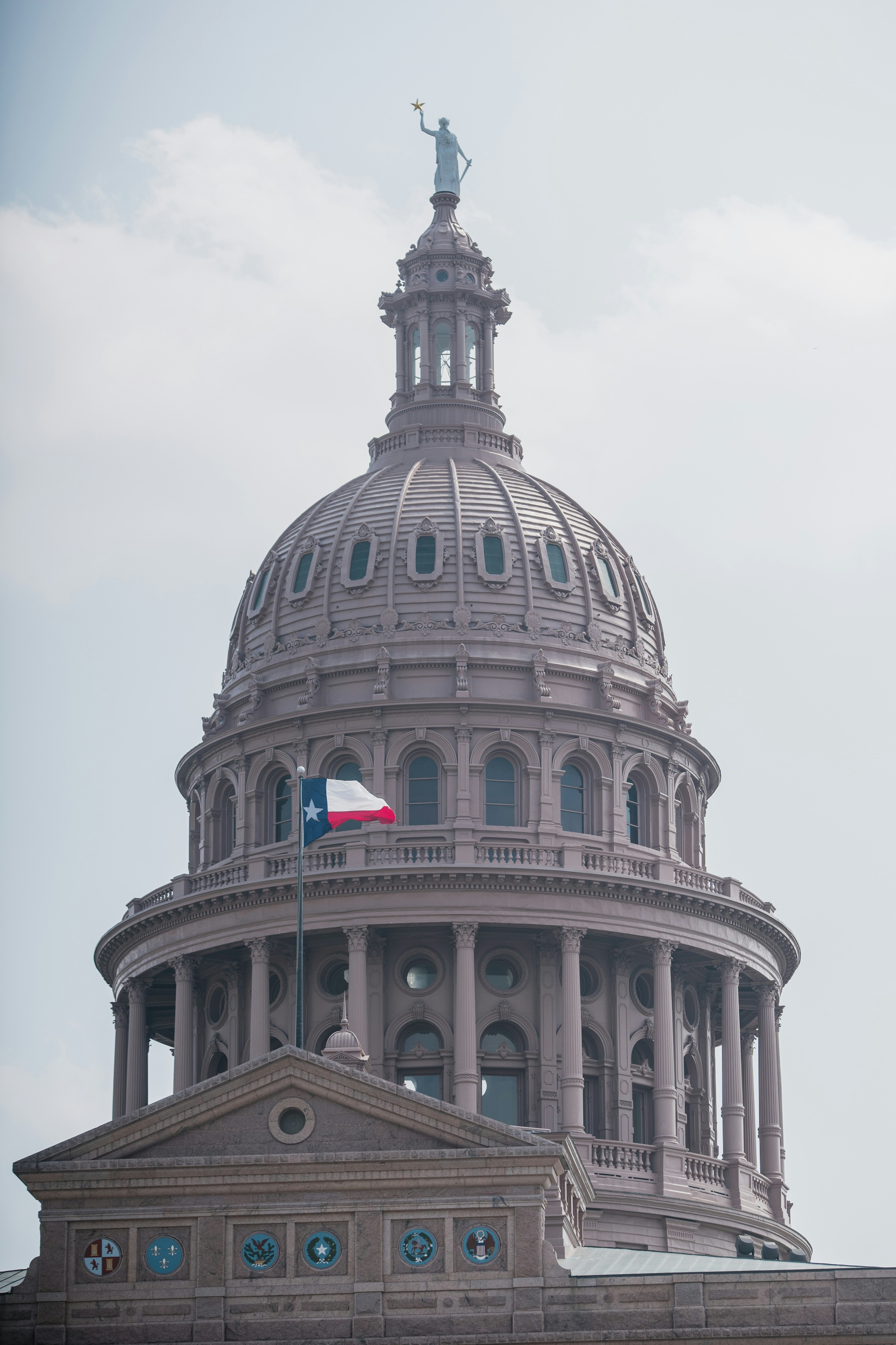 gray concrete building under white sky during daytime